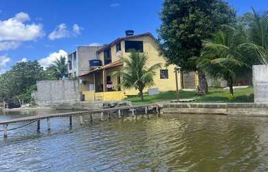 Imagem 1: Casa pequena com vista deslumbrante da lagoa de Guaratiba