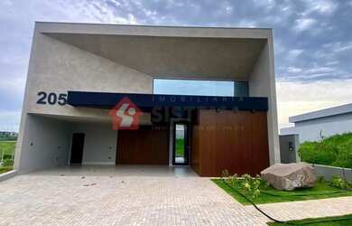 Imagem: A casa em condomínio possui 4 Dormitórios, 5 Banheiros, 5