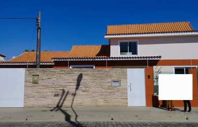 Imagem: A casa possui 3 Dormitórios, 5 Banheiros, 4 Vagas na garagem