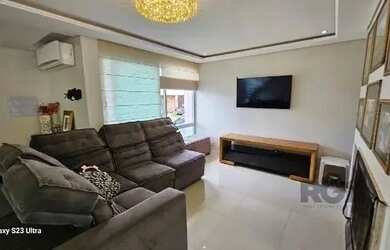 Imagem 6: Casa em Porto Alegre, no bairro Hípica, com 3 dormitório s , e 3 banheiros,...