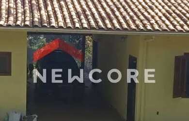 Imagem: A casa possui 3 Dormitórios, 3 Banheiros, 4 Vagas na garagem