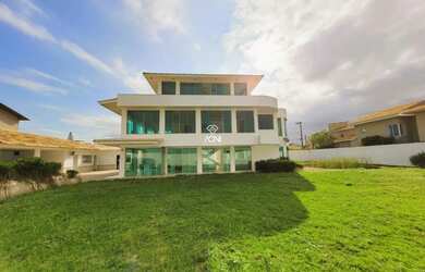 Imagem: A casa possui 4 Dormitórios, 5 Banheiros, 5 Vagas na garagem