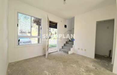 Imagem: A casa em condomínio possui 2 Dormitórios, 2 Banheiros, 1