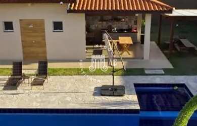 Imagem: A casa em condomínio possui 5 Dormitórios, 5 Banheiros, 4