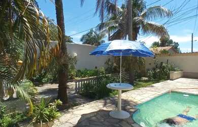 Imagem: A casa à venda possui 4 Dormitórios, 5 Banheiros, 5 Vagas