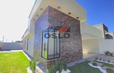 Imagem: A casa possui 3 Dormitórios, 5 Banheiros, 3 Vagas na garagem