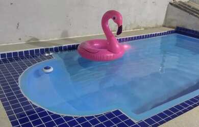 Imagem: A casa possui 2 Dormitórios, Acomodam 8 pessoas, Imóvel novo