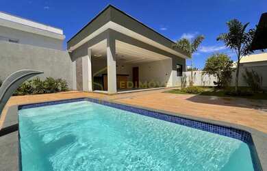 Imagem: A casa possui 4 Dormitórios, 4 Banheiros, 4 Vagas na garagem