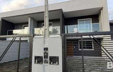 Imagem: A casa possui 3 Dormitórios, 2 Banheiros, 2 Vagas na garagem