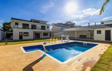 Imagem: A casa em condomínio possui 4 Dormitórios, 5 Banheiros, 4