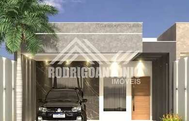 Imagem: A casa possui 3 Dormitórios, 2 Banheiros, 2 Vagas na garagem