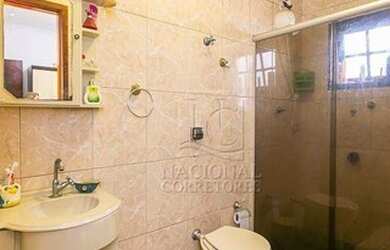 Imagem: A casa possui 3 Dormitórios, 4 Banheiros, 2 Vagas na garagem