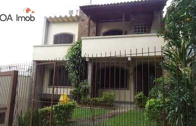 Imagem: A casa possui 3 Dormitórios, 3 Banheiros, 3 Vagas na garagem