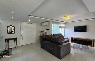 Imagem 10: Casa em Porto Alegre, no bairro Hípica, com 3 dormitório s , e 3 banheiros,...