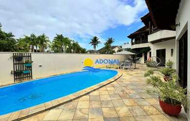 Imagem: A casa em condomínio possui 5 Dormitórios, 5 Banheiros, 4