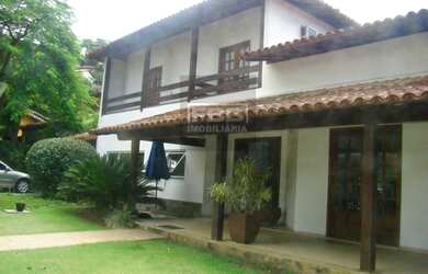 Imagem: A casa possui 5 Dormitórios, 4 Banheiros, 5 Vagas na garagem