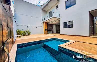 Imagem: A casa possui 3 Dormitórios, 4 Banheiros, 3 Vagas na garagem