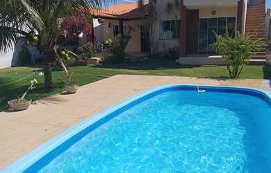 Imagem: A casa possui 3 Dormitórios, 2 Vagas na garagem e está localizado