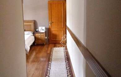 Imagem: A casa possui 4 Dormitórios, 5 Banheiros, 5 Vagas na garagem