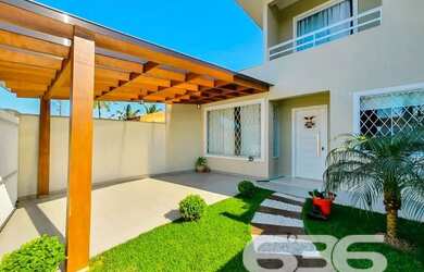 Imagem: A casa possui 2 Dormitórios, 2 Banheiros, 1 Vaga na garagem