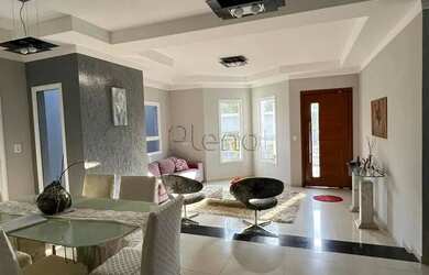 Imagem: A casa possui 3 Dormitórios, 4 Banheiros, 3 Vagas na garagem