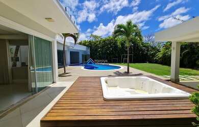 Imagem: A casa em condomínio possui 4 Dormitórios, 5 Banheiros, 4