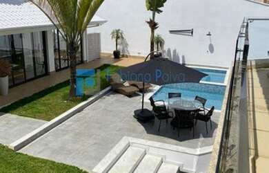 Imagem: A casa em condomínio possui 5 Dormitórios, 5 Banheiros, 5