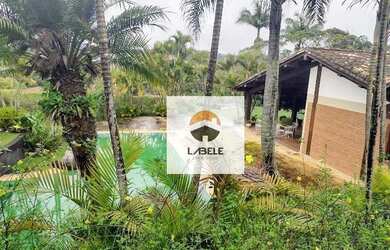 Imagem: A casa em condomínio possui 5 Dormitórios, 5 Banheiros, 5