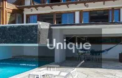 Imagem: A casa possui 5 Dormitórios, 5 Banheiros, 5 Vagas na garagem