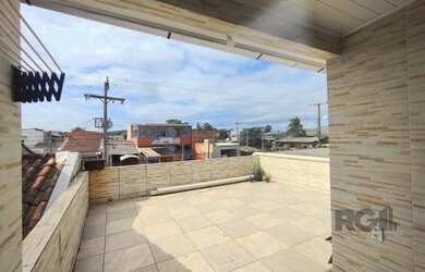 Imagem: A casa possui 3 Dormitórios, 2 Banheiros, 1 Vaga na garagem