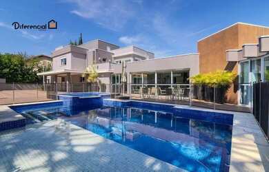 Imagem: A casa em condomínio possui 5 Dormitórios, 5 Banheiros, 5