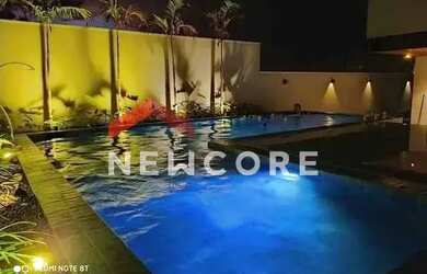 Imagem: A casa possui 3 Dormitórios, 5 Banheiros, 2 Vagas na garagem