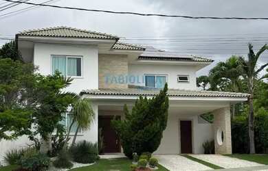 Imagem: A casa em condomínio possui 5 Dormitórios, 5 Banheiros, 4