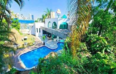 Imagem: A casa em condomínio possui 4 Dormitórios, 5 Banheiros, 5