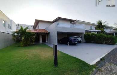 Imagem: A casa possui 5 Dormitórios, 5 Banheiros, 5 Vagas na garagem