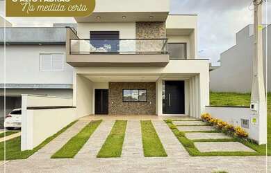 Imagem: A casa possui 3 Dormitórios, 3 Banheiros, 2 Vagas na garagem