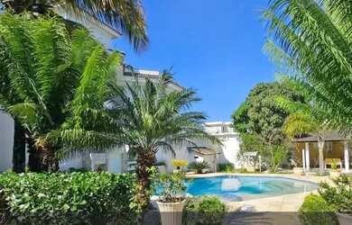 Imagem: A casa em condomínio possui 5 Dormitórios, 5 Banheiros, 3