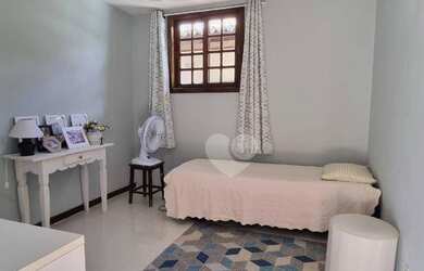 Imagem: A casa em condomínio possui 5 Dormitórios, 5 Banheiros, 4