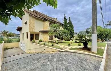 Imagem: A casa em condomínio possui 4 Dormitórios, 5 Banheiros, 5