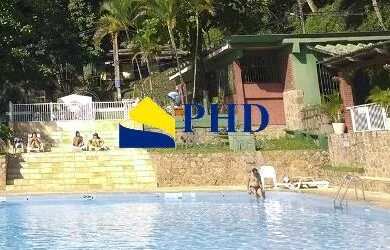 Imagem: A casa em condomínio possui 5 Dormitórios, 5 Banheiros, 2