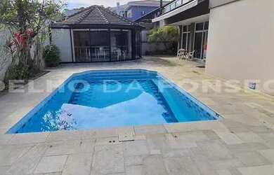 Imagem: A casa em condomínio possui 4 Dormitórios, 4 Banheiros, 5