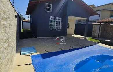 Imagem: A casa possui 3 Dormitórios, 3 Banheiros, 5 Vagas na garagem