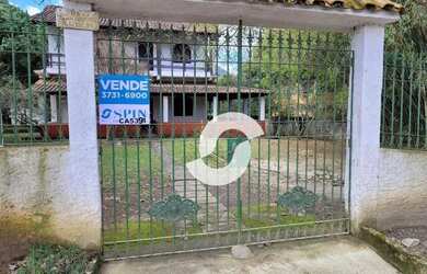 Imagem: A casa possui 5 Dormitórios, 2 Banheiros, 2 Vagas na garagem