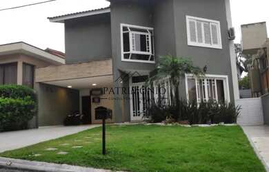 Imagem: A casa em condomínio possui 4 Dormitórios, 5 Banheiros, 5