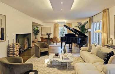 Imagem: A casa possui 5 Dormitórios, 4 Banheiros, 5 Vagas na garagem