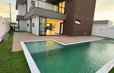 Imagem: A casa à venda possui 4 Dormitórios, 5 Banheiros, 2 Vagas