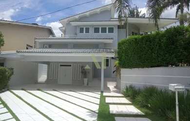 Imagem: A casa em condomínio possui 4 Dormitórios, 5 Banheiros, 4