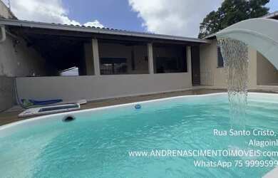 Imagem: A casa possui 3 Dormitórios, 4 Banheiros, 3 Vagas na garagem