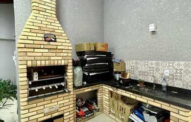 Imagem: A casa possui 3 Dormitórios, 4 Banheiros, 3 Vagas na garagem