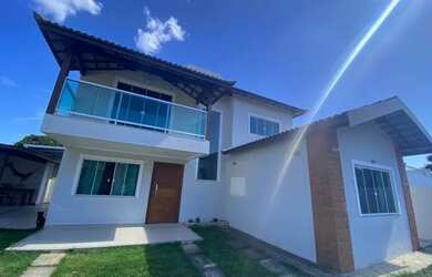 Imagem: A casa possui 3 Dormitórios, 2 Banheiros, 5 Vagas na garagem